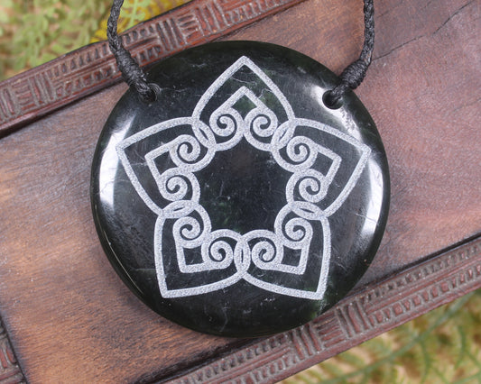 Porowhita or Pi Stone carved from Kawakawa Pounamu - NZ Greenstone
