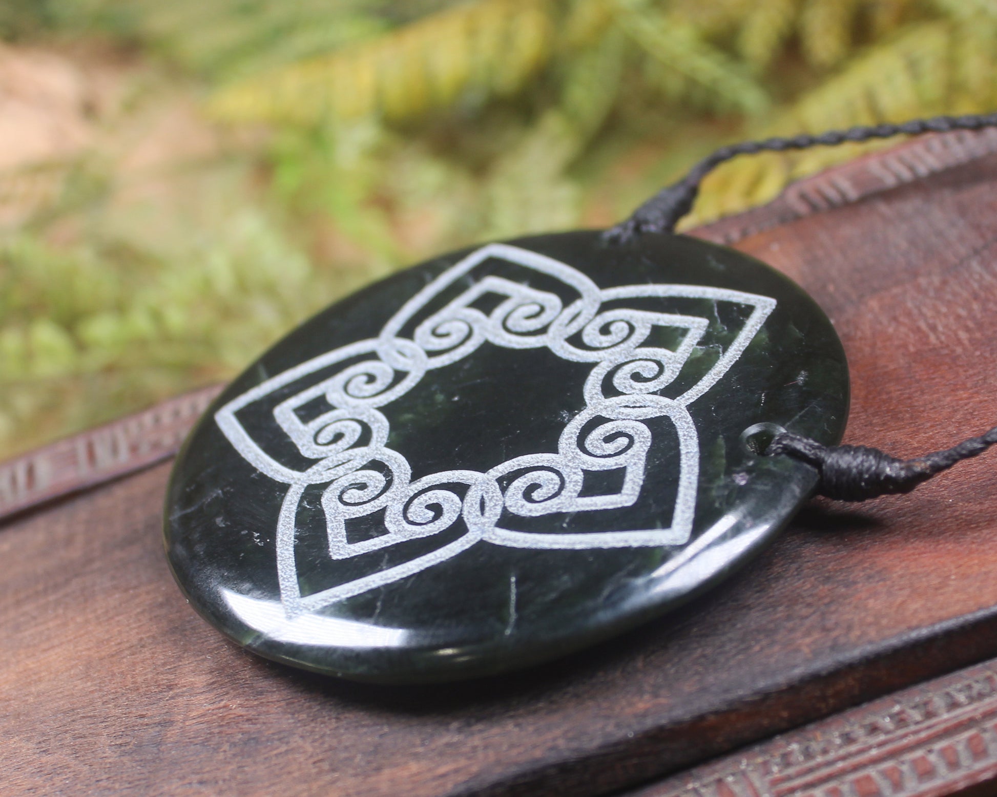 Porowhita or Pi Stone carved from Kawakawa Pounamu - NZ Greenstone