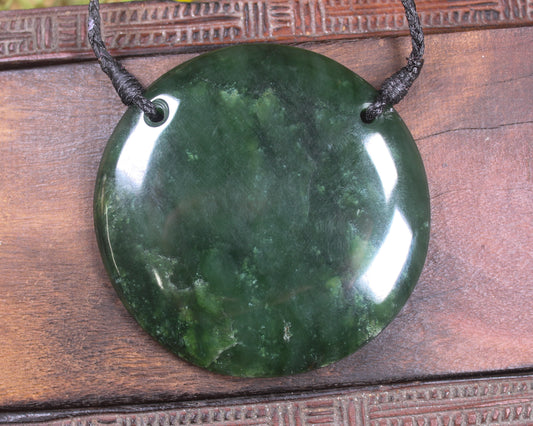 Porowhita or Pi Stone carved from Kawakawa Pounamu - NZ Greenstone