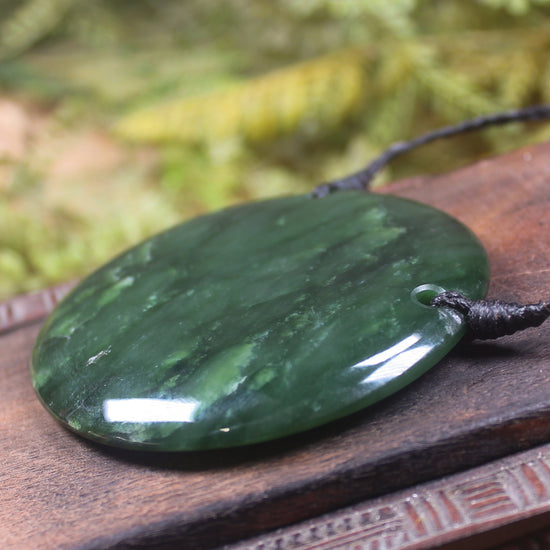 Porowhita or Pi Stone carved from Kawakawa Pounamu - NZ Greenstone