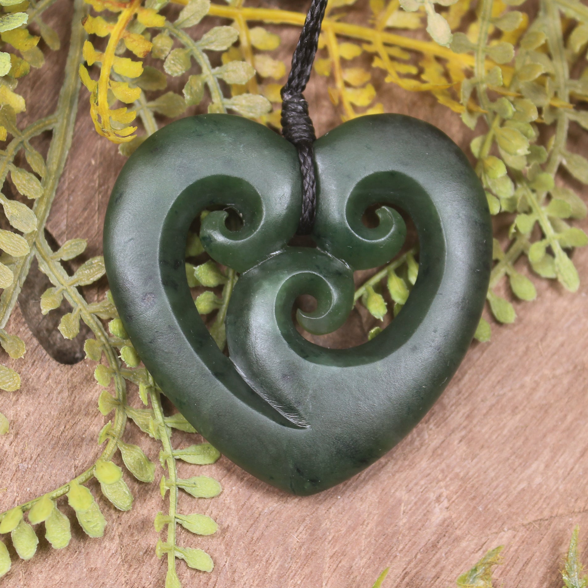 Heart with Koru carved from Kawakawa Pounamu - NZ Greenstone