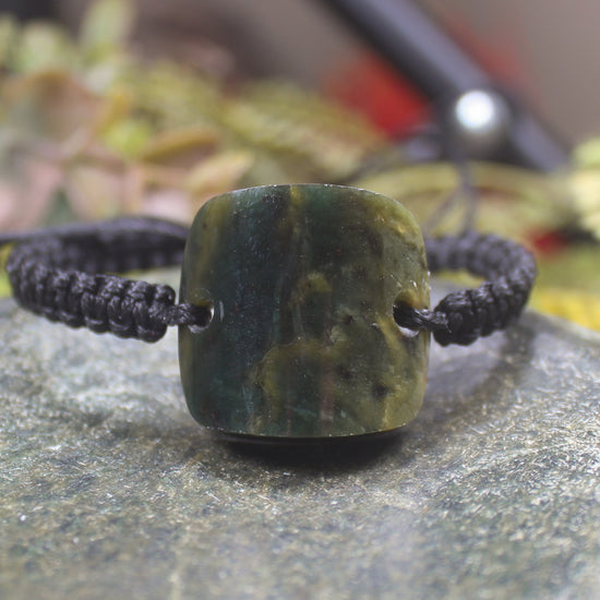 Adjustable cord bracelet with Rimu Pounamu