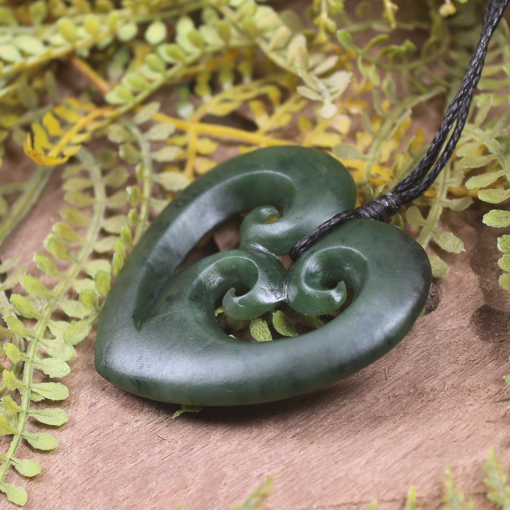 Heart with Koru carved from Kawakawa Pounamu - NZ Greenstone