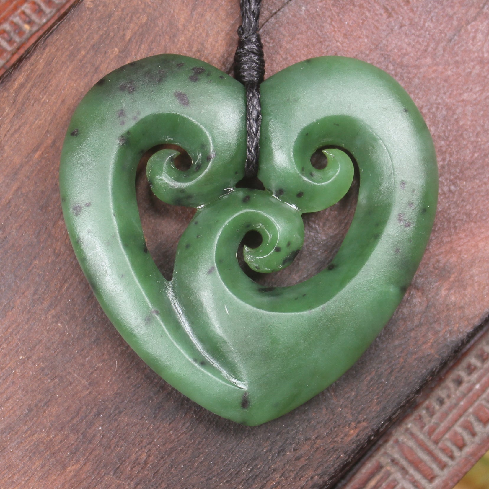 Koru Heart pendant carved from Hapopo Pounamu - NZ Greenstone