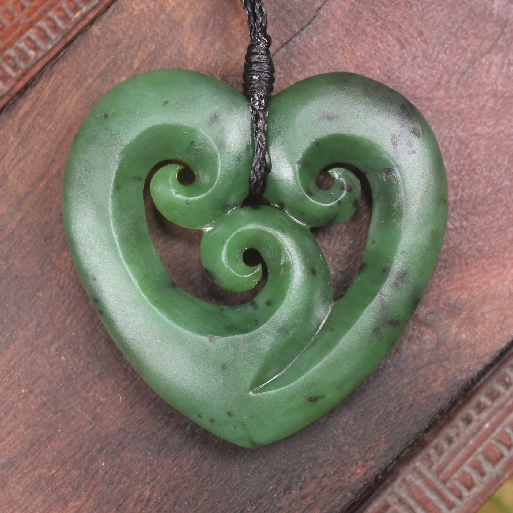 Koru Heart pendant carved from Hapopo Pounamu - NZ Greenstone