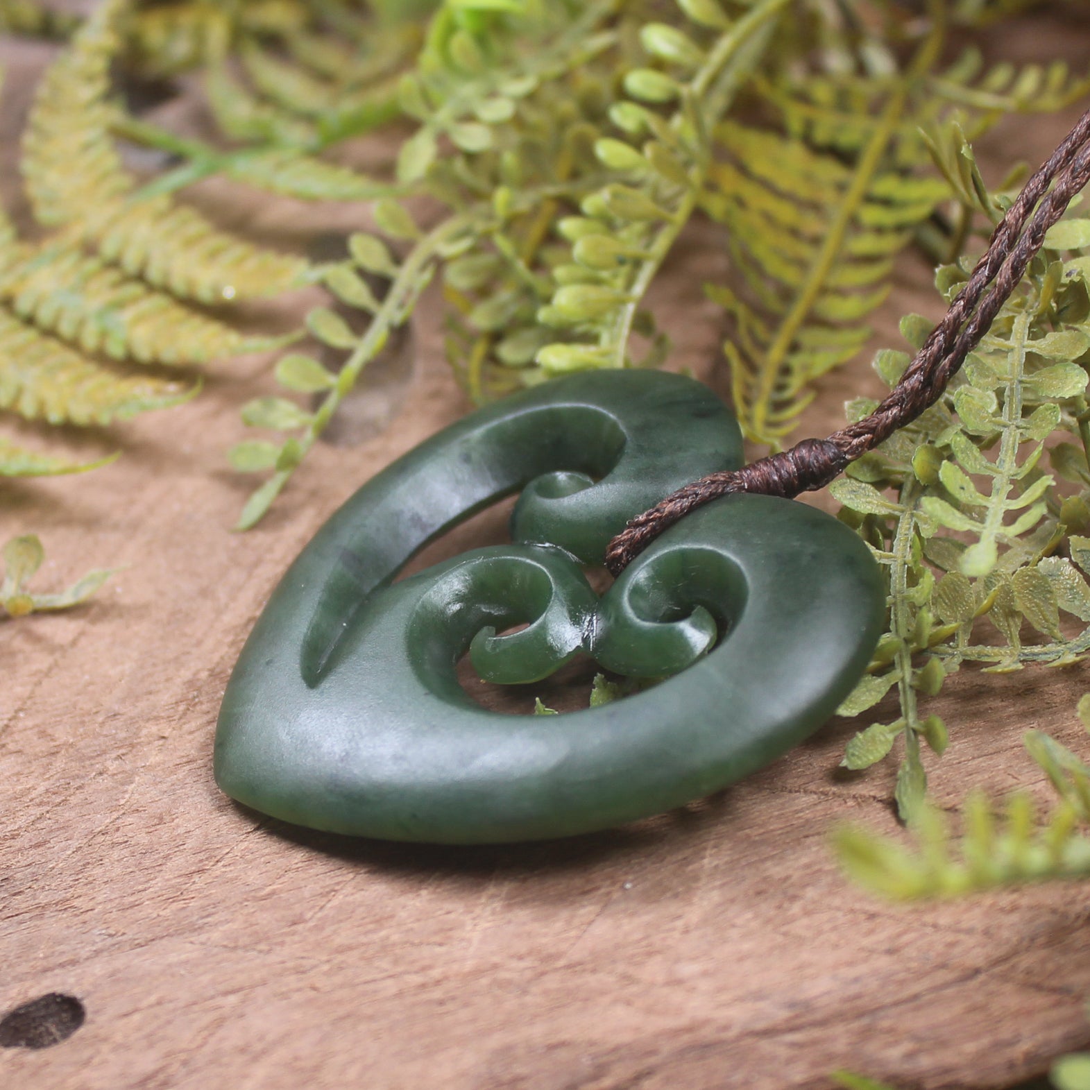 Heart with Koru carved from Kawakawa Pounamu - NZ Greenstone