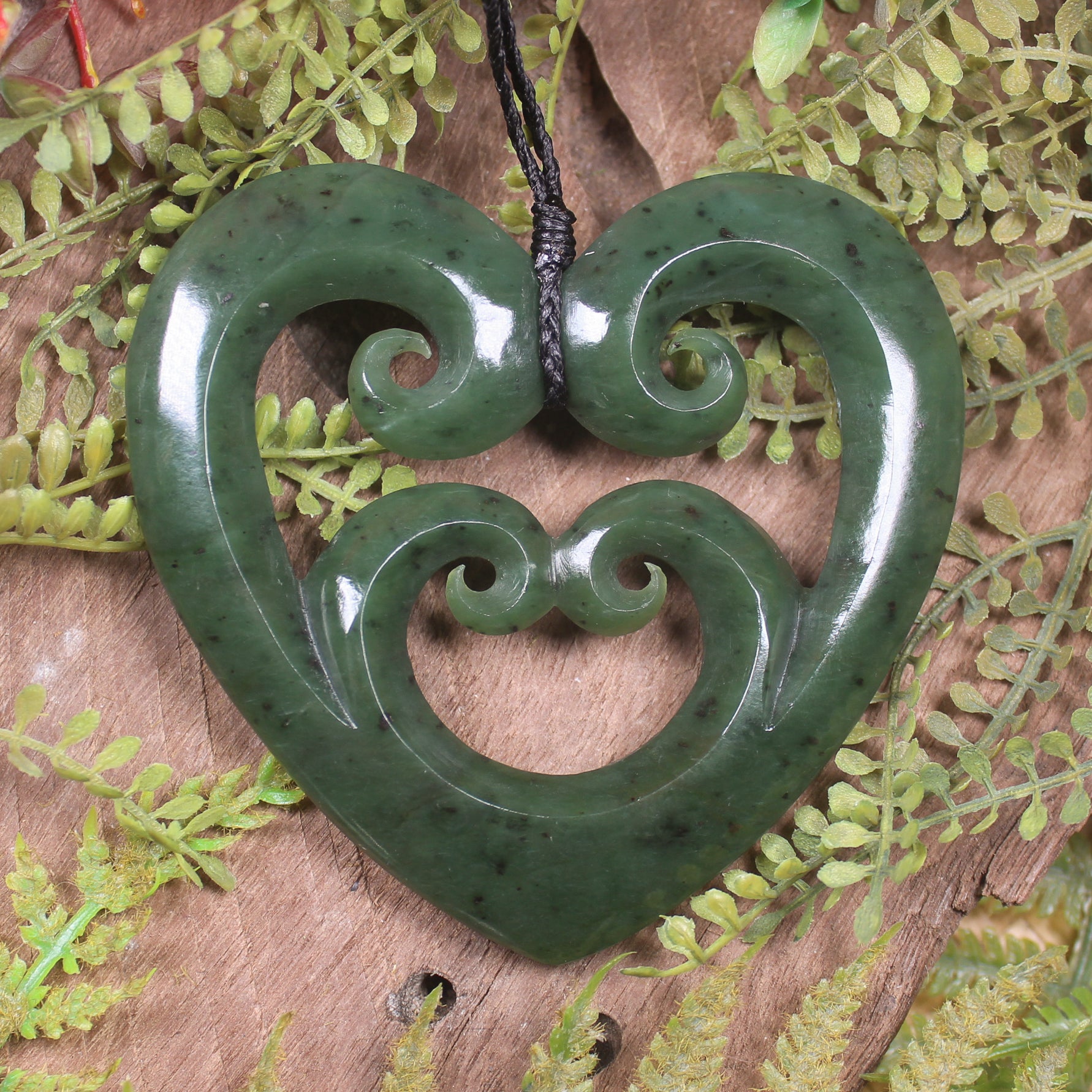 Heart with Koru carved from Hapopo Pounamu - NZ Greenstone