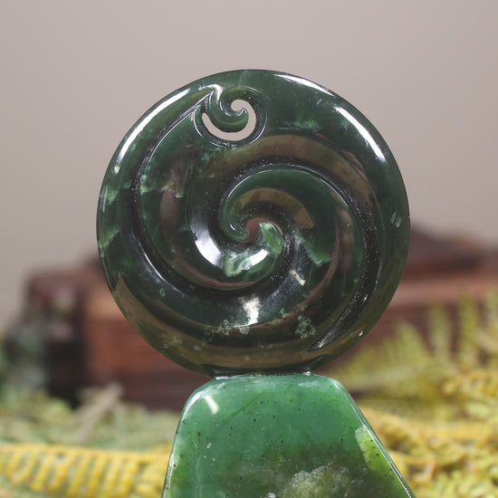 Koru sculpture carved from Kawakawa Pounamu - NZ Greenstone