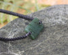 Adjustable cord bracelet with Rimu Pounamu