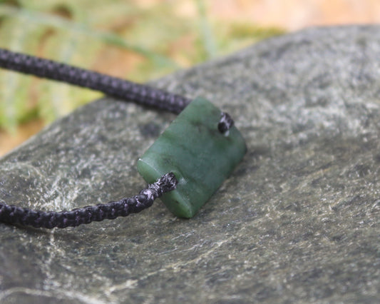Adjustable cord bracelet with Rimu Pounamu