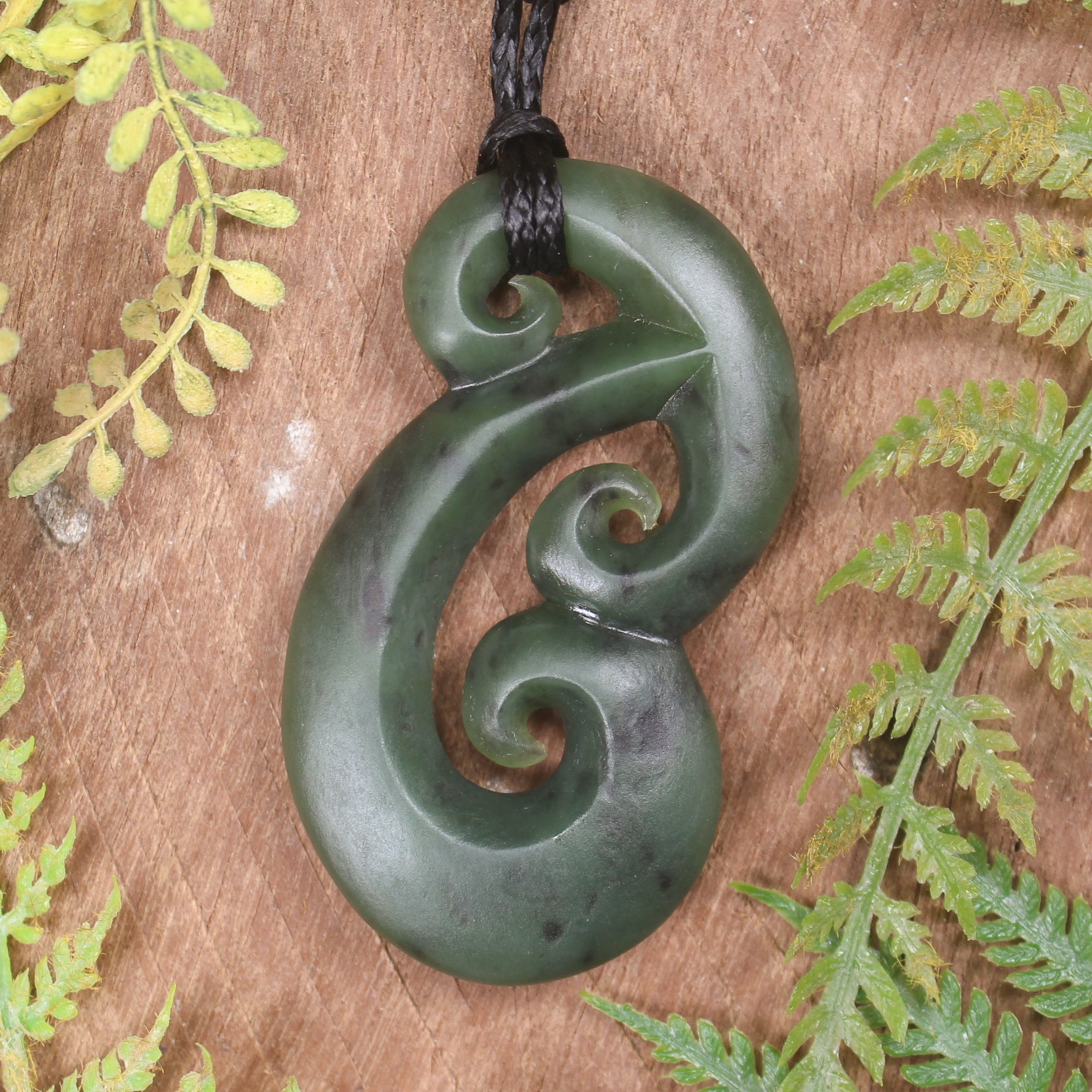 Hammerhead pendant carved from Hapopo Pounamu - NZ Greenstone