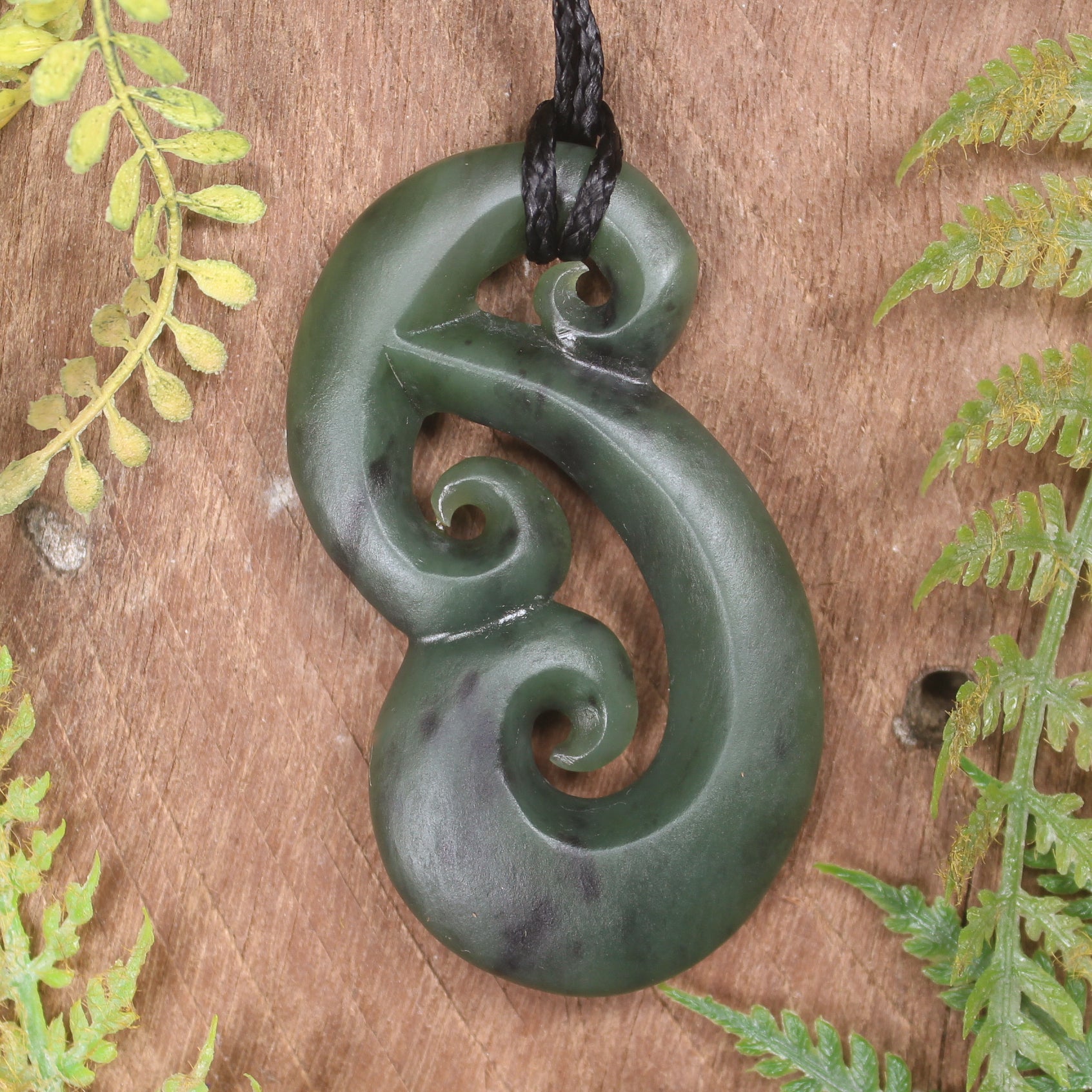 Hammerhead pendant carved from Hapopo Pounamu - NZ Greenstone