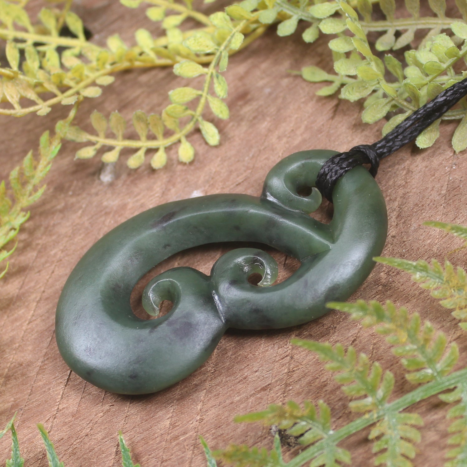 Hammerhead pendant carved from Hapopo Pounamu - NZ Greenstone