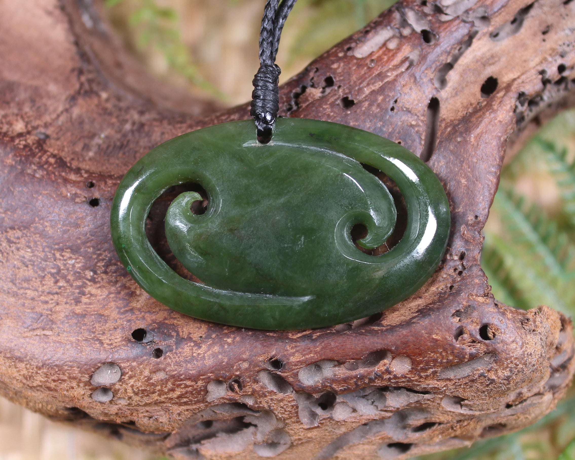 Koru pendant carved from Kawakawa Pounamu - NZ Greenstone