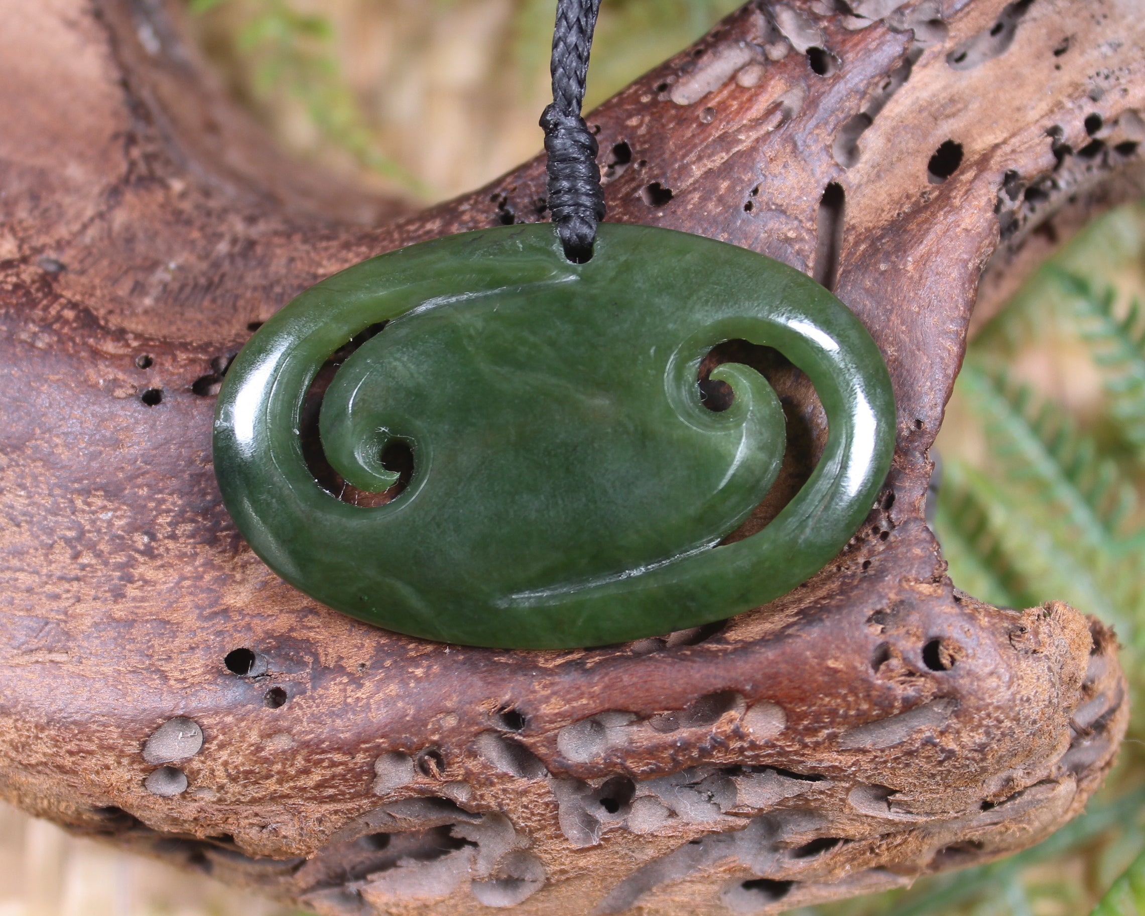 Koru pendant carved from Kawakawa Pounamu - NZ Greenstone