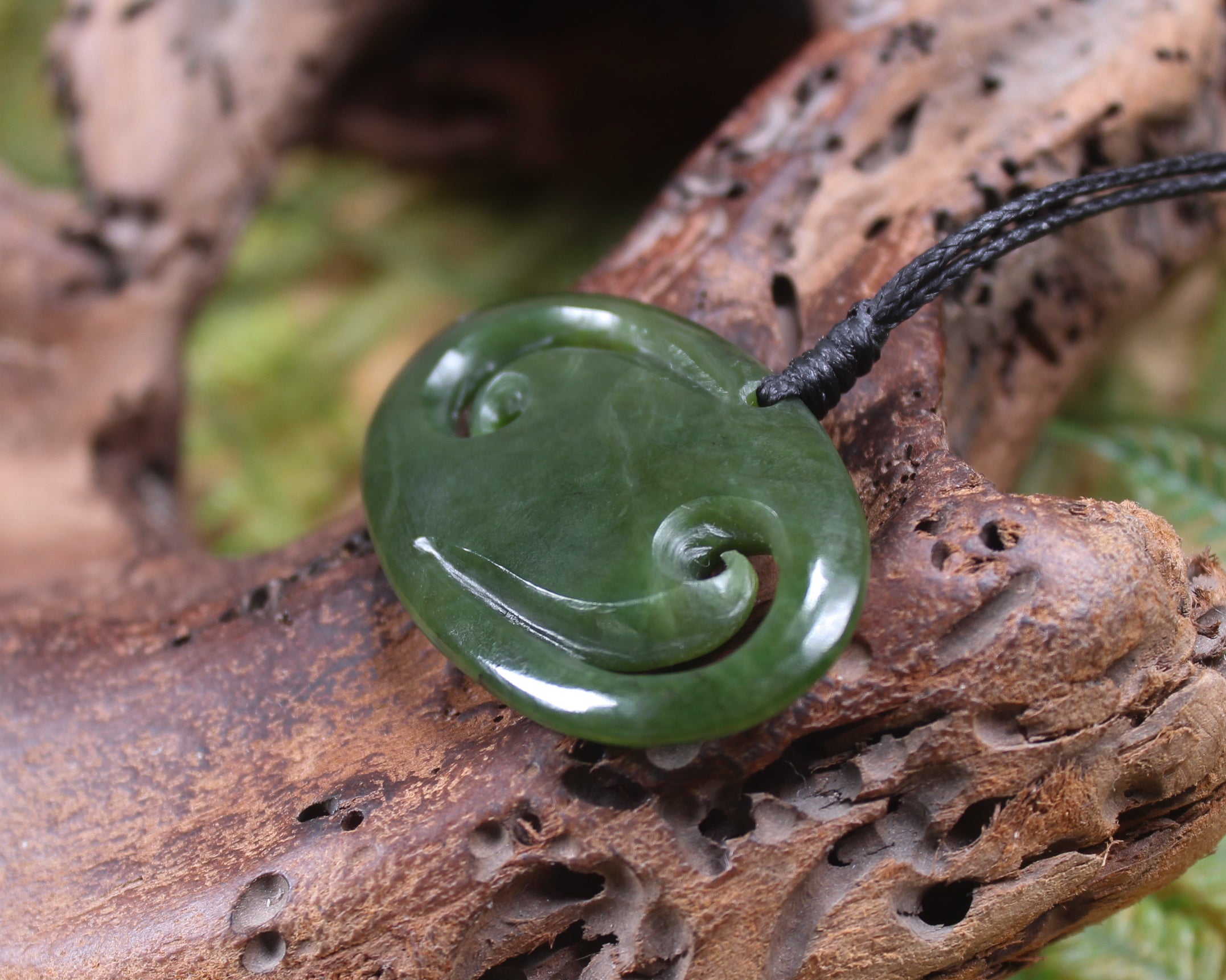 Koru pendant carved from Kawakawa Pounamu - NZ Greenstone