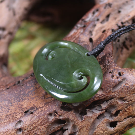 Koru pendant carved from Kawakawa Pounamu - NZ Greenstone