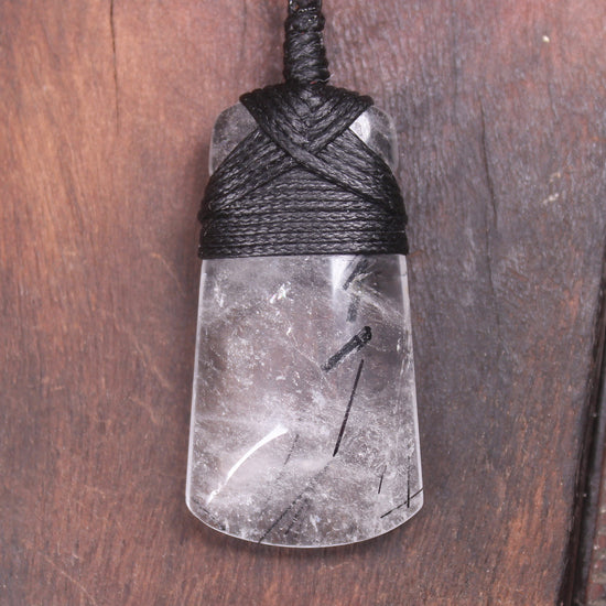 Quartz with Black Tourmaline carved into a Toki or Adze