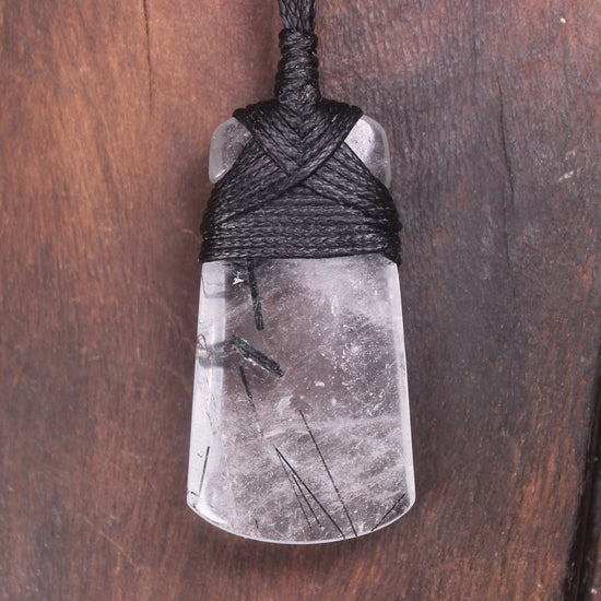 Quartz with Black Tourmaline carved into a Toki or Adze