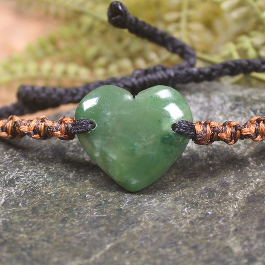 Adjustable cord bracelet with Kawakawa Pounamu