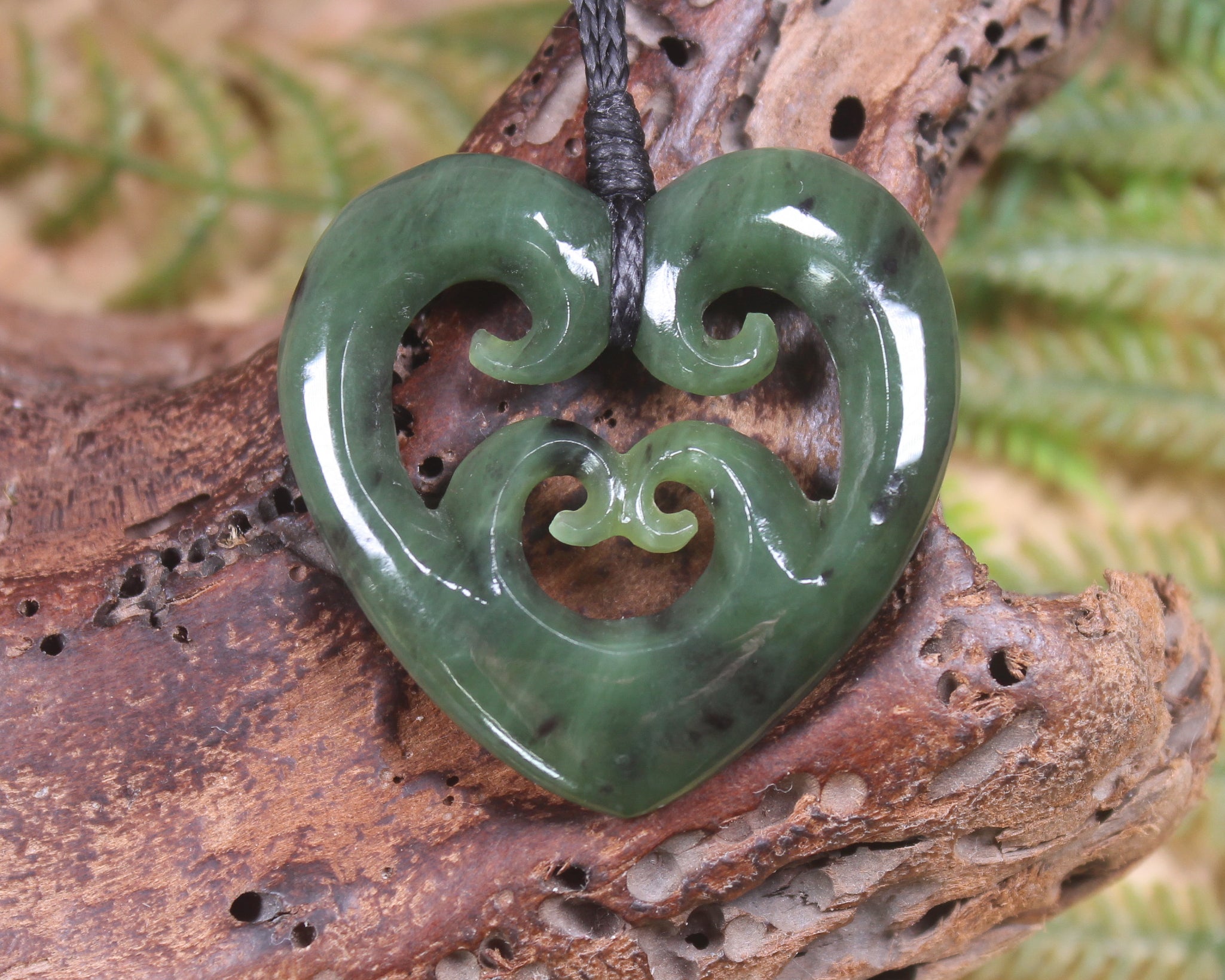 Koru Heart pendant carved from Hapopo Pounamu - NZ Greenstone