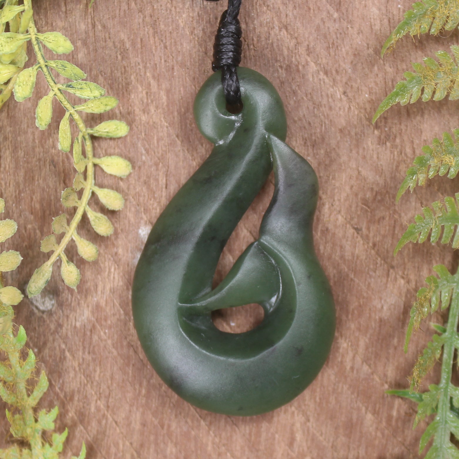 Whale tail carved from Hapopo Pounamu - NZ Greenstone