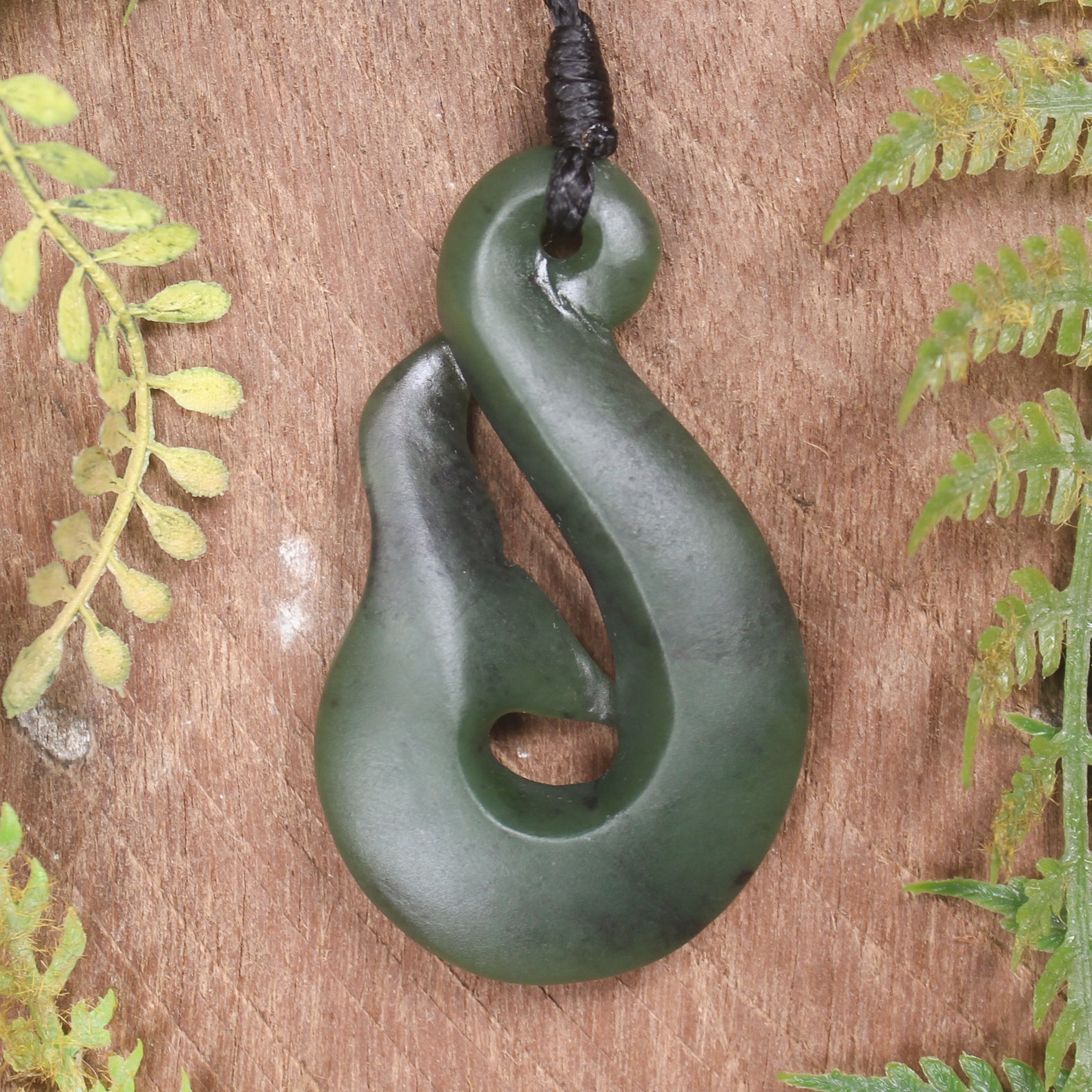Whale tail carved from Hapopo Pounamu - NZ Greenstone