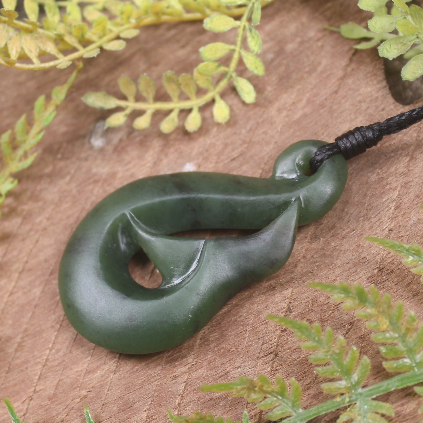 Whale tail carved from Hapopo Pounamu - NZ Greenstone