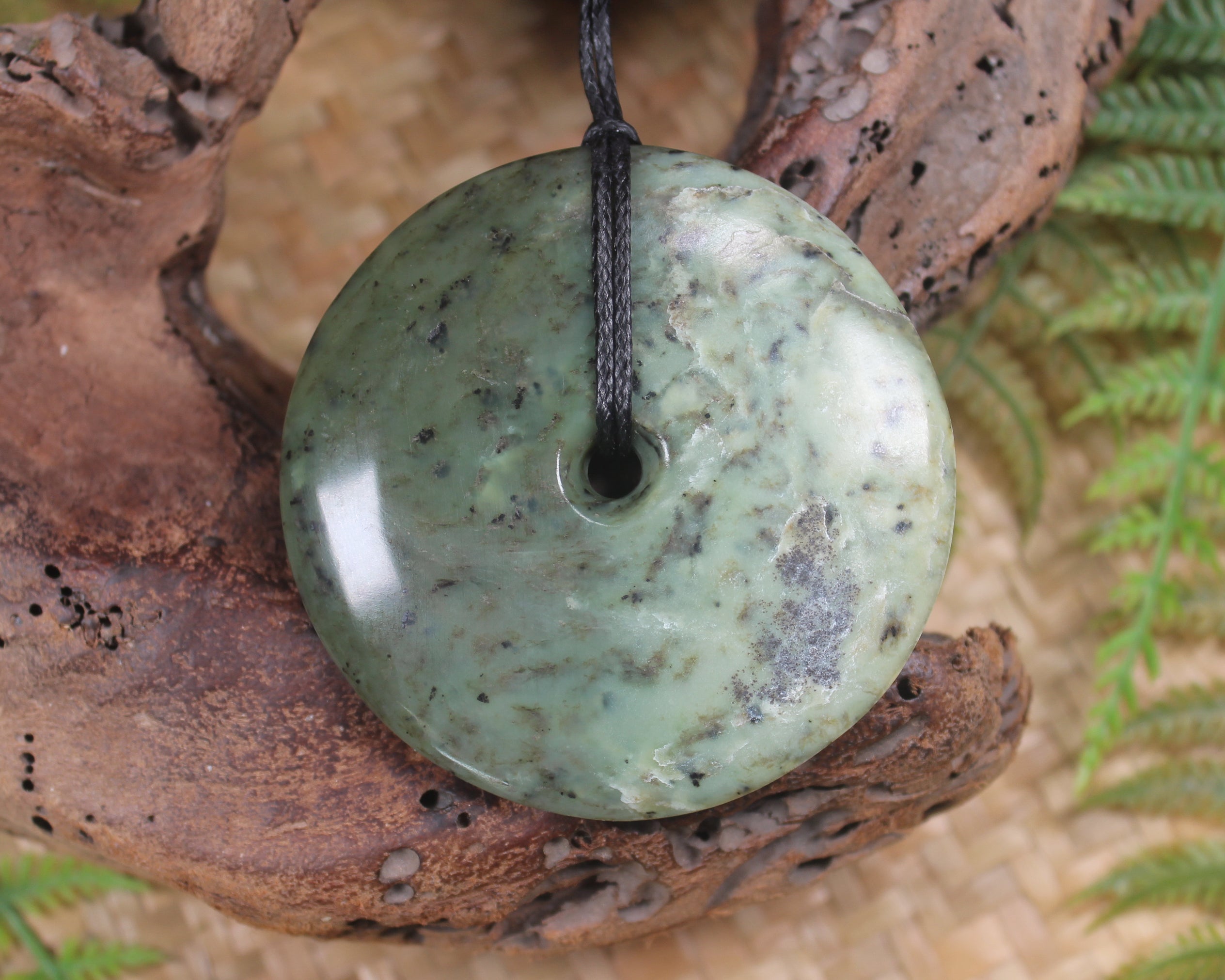 Porowhita carved from Rimu Pounamu - NZ Greenstone