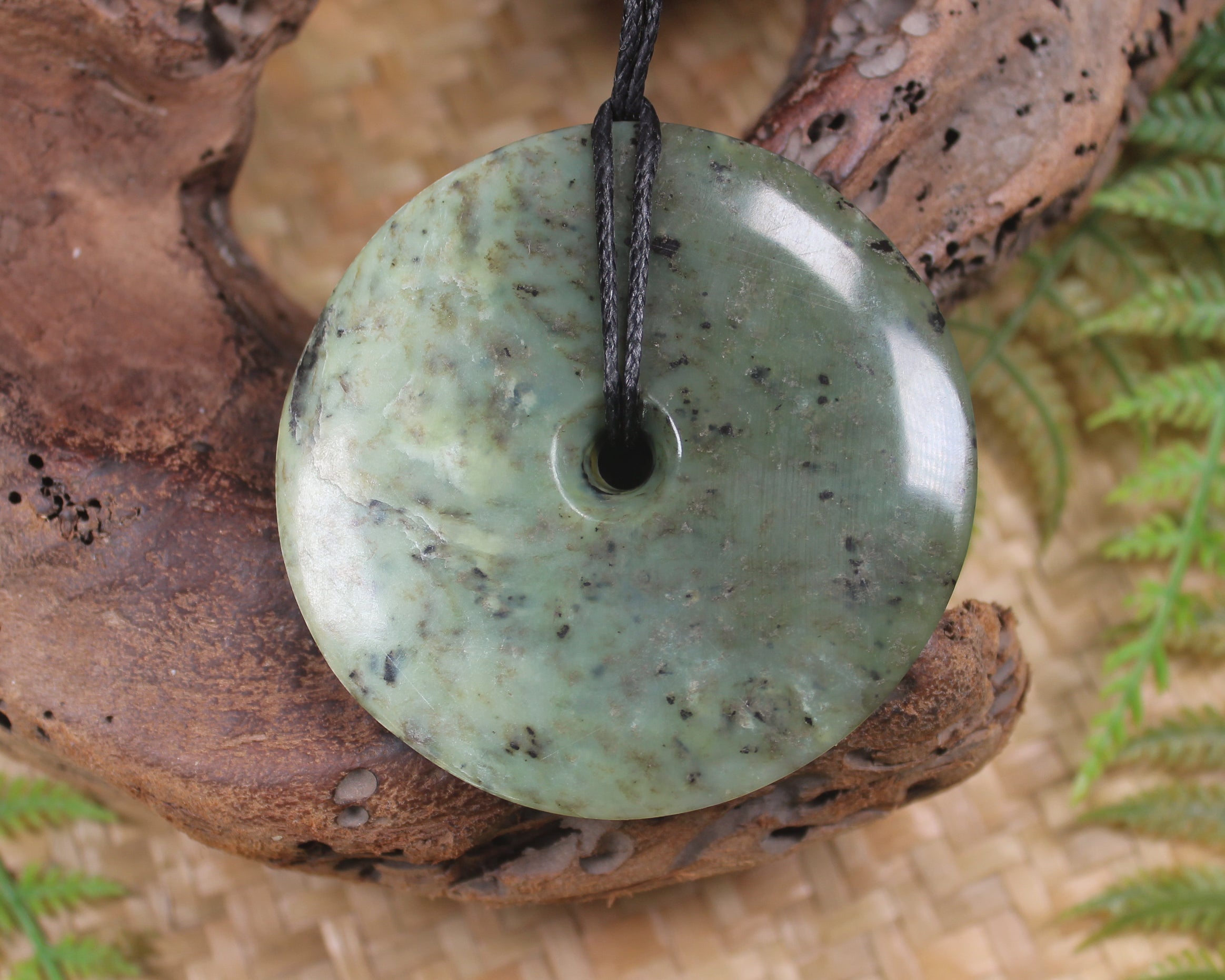 Porowhita carved from Rimu Pounamu - NZ Greenstone