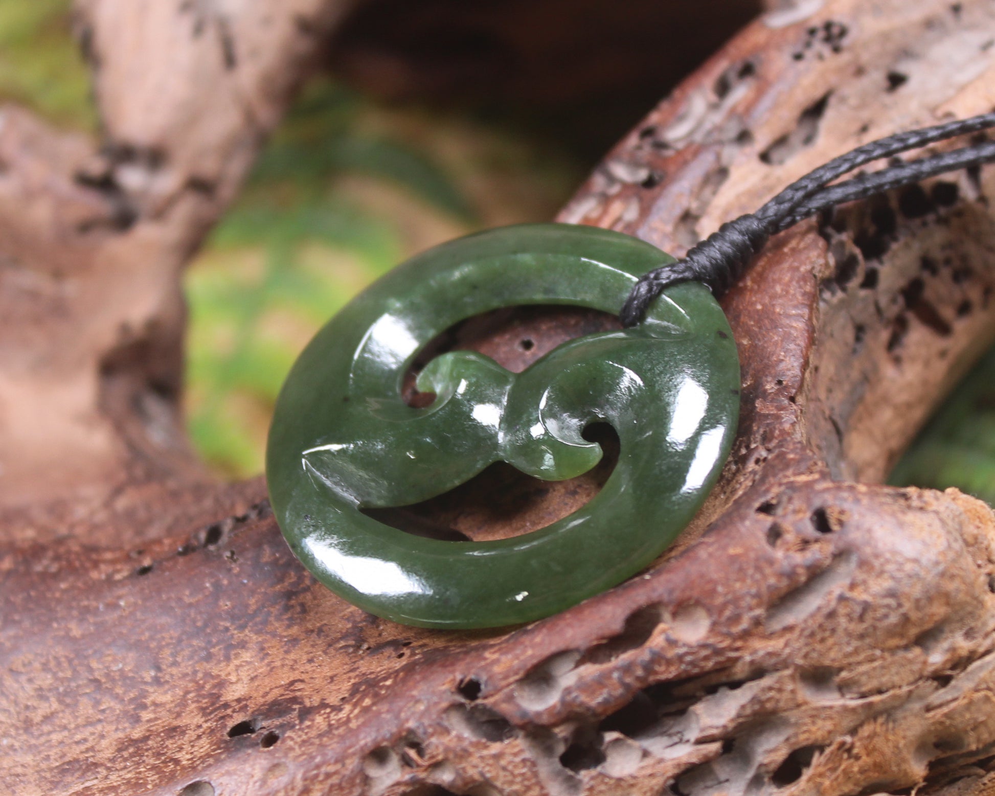 Koru carved from Rimu Pounamu - NZ Greenstone