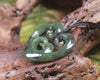 Heart with Koru carved from Hapopo Pounamu - NZ Greenstone