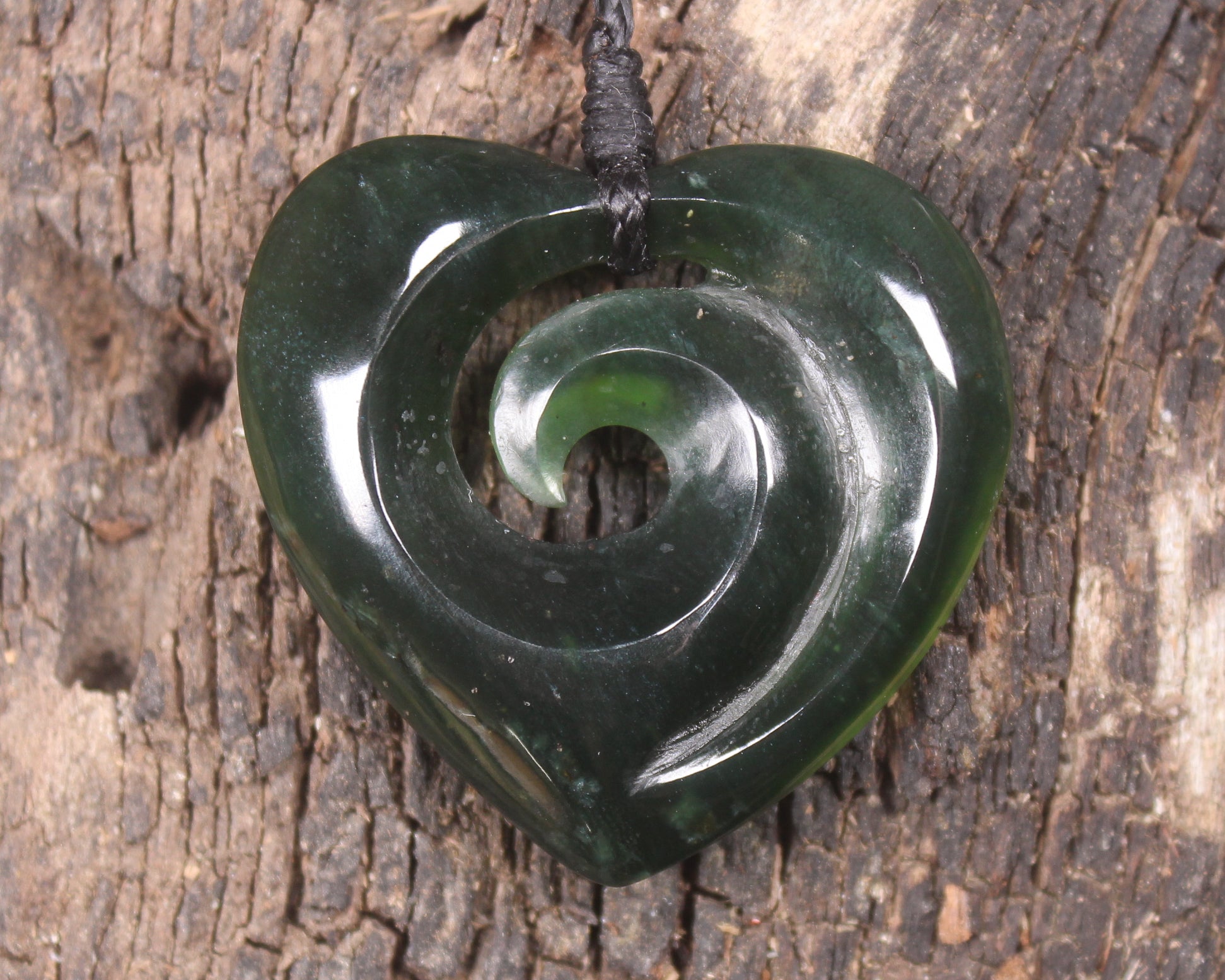 Heart with Koru carved from Tangiwai  Pounamu - NZ Greenstone