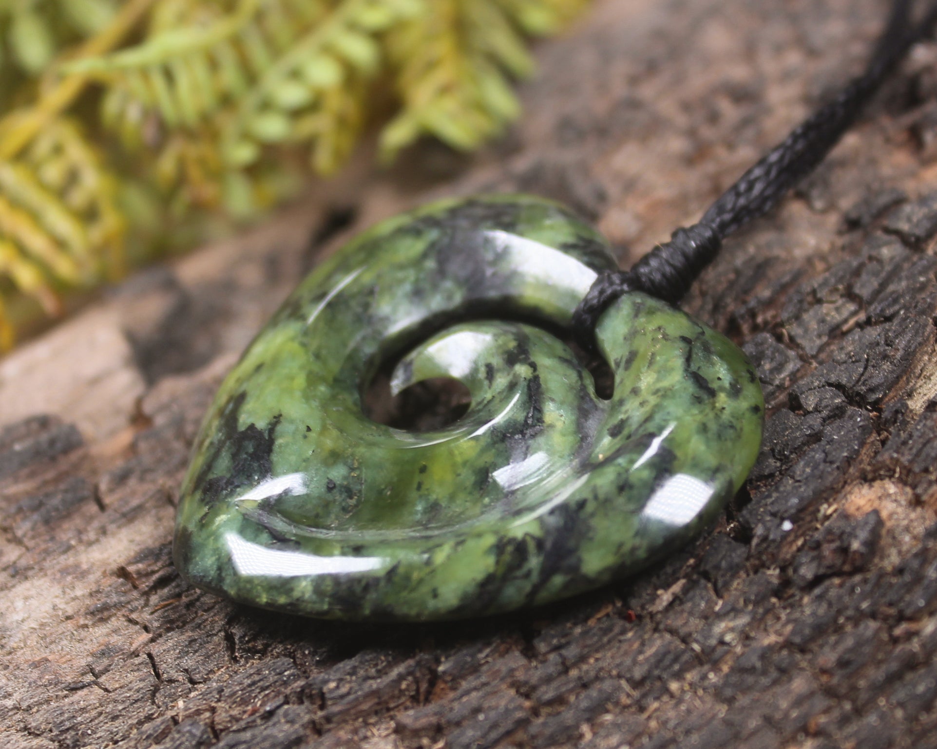 Heart with Koru carved from Douglas Creek Pounamu - NZ Greenstone
