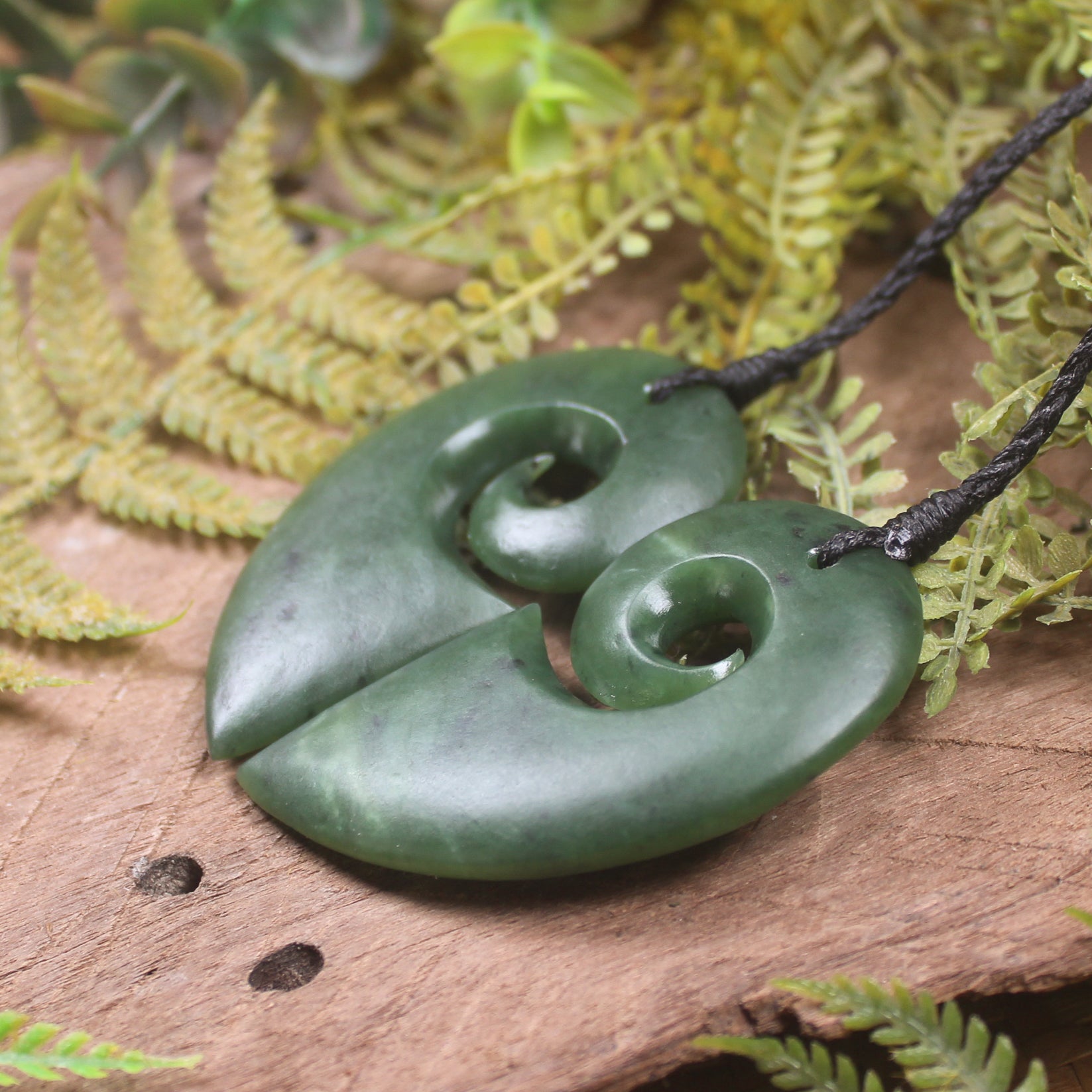 Koru Heart pendant carved from Hapopo Pounamu - NZ Greenstone