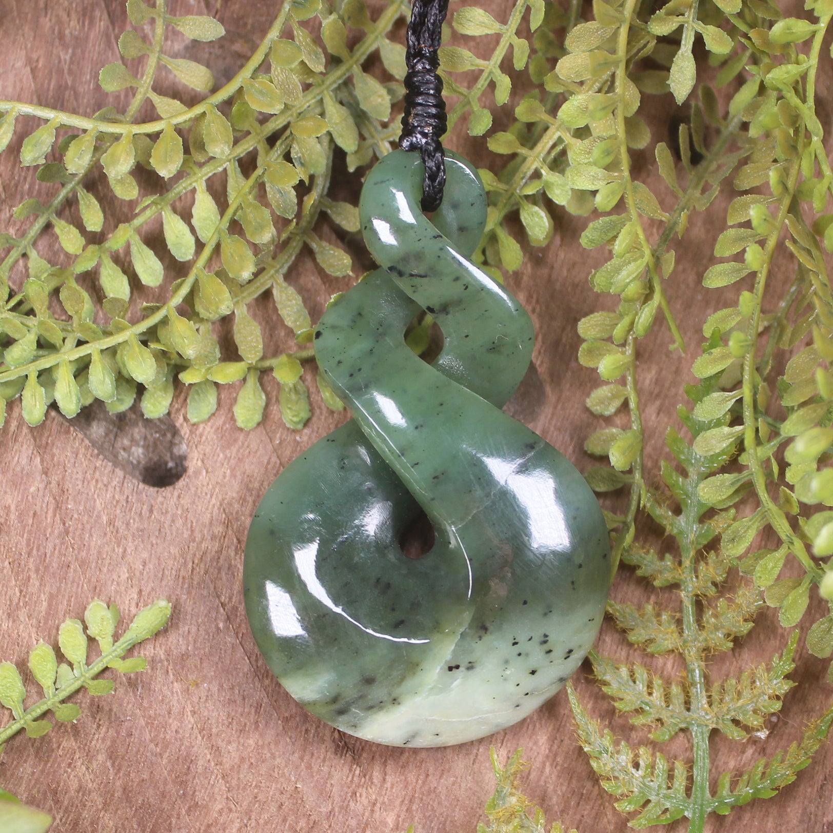 Twist or Pikorua carved from Hapopo Pounamu - NZ Greenstone