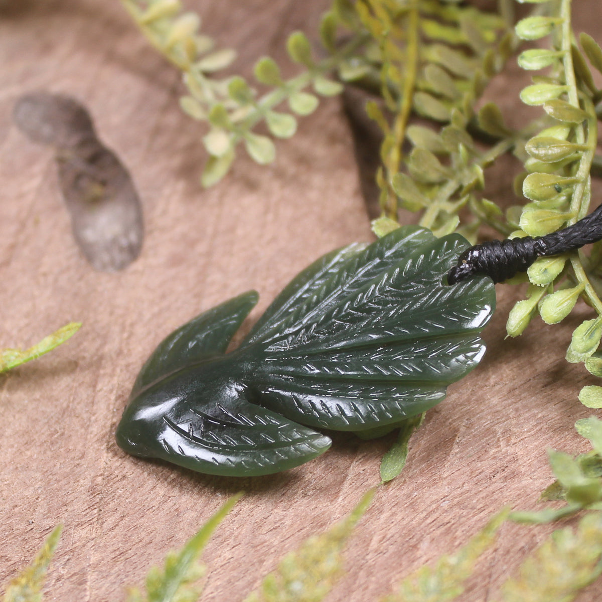 Pīwakawaka or Fantail Bird Pendant carved from Kawakawa Pounamu - NZ Greenstone