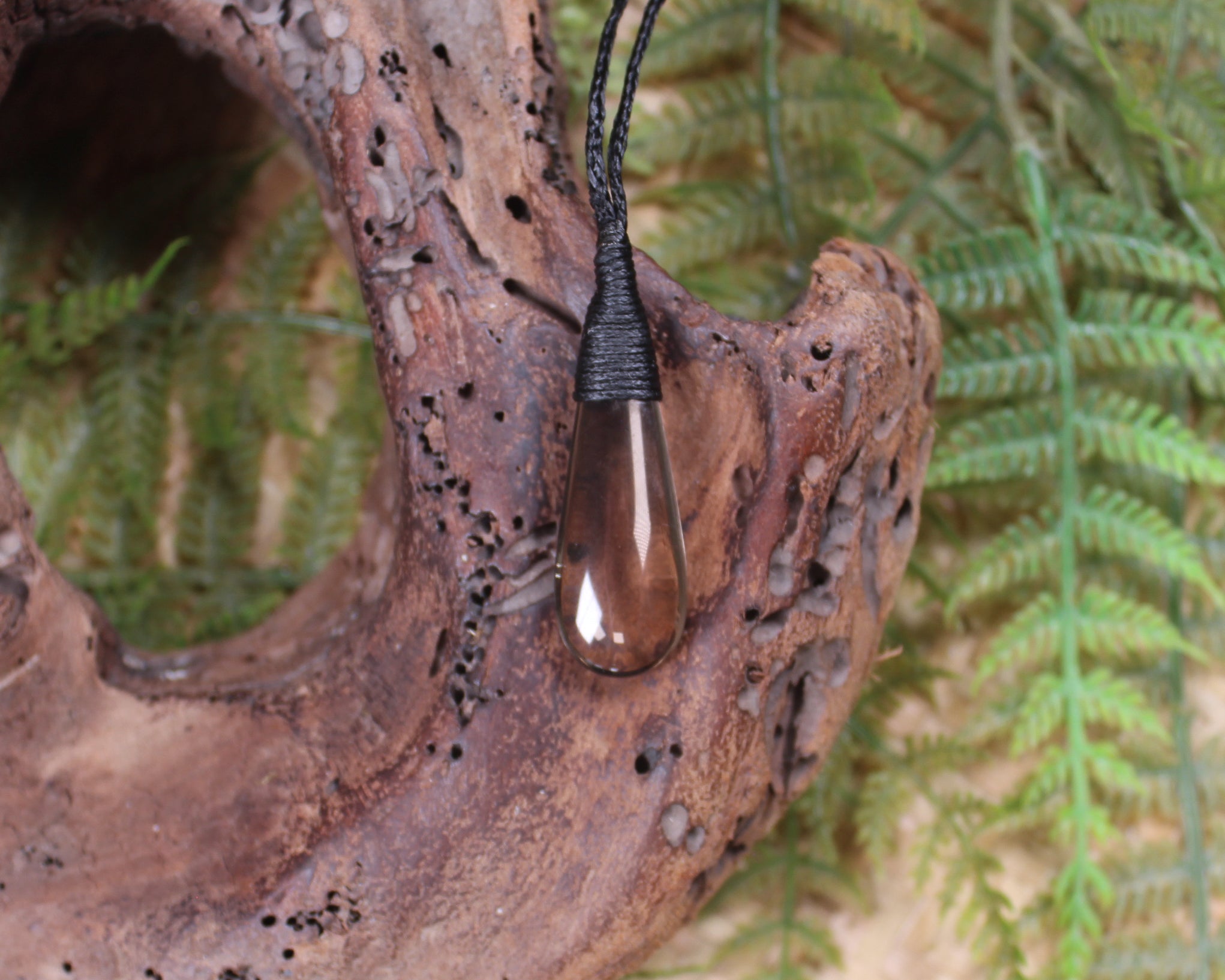 Roimata pendant carved from Smokey Quartz