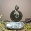 Rimu Pounamu Koru Twist set on a Pounamu base - NZ Greenstone