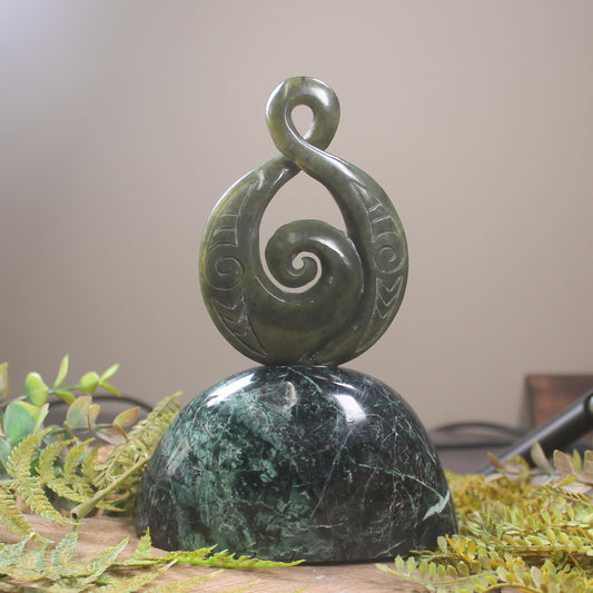 Rimu Pounamu Koru Twist set on a Pounamu base - NZ Greenstone