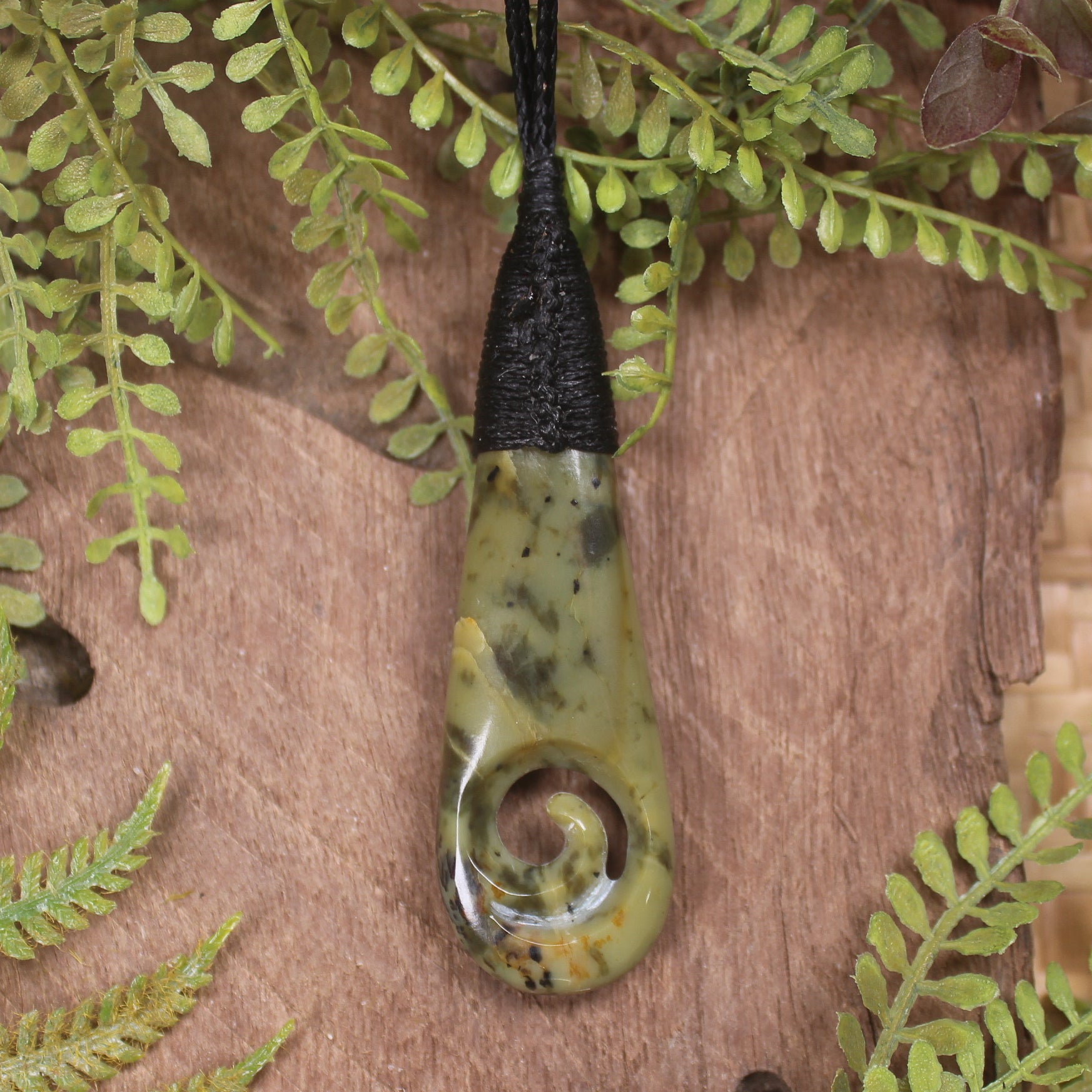 Roimata or Teardop with Koru carved from Rimu Pounamu - NZ Greenstone