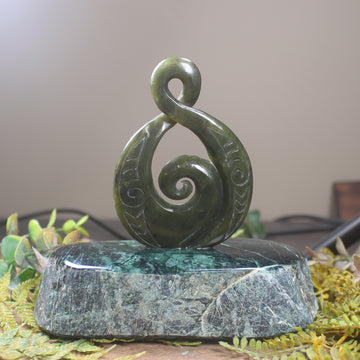 Rimu Pounamu Koru Twist set on a Pounamu base - NZ Greenstone