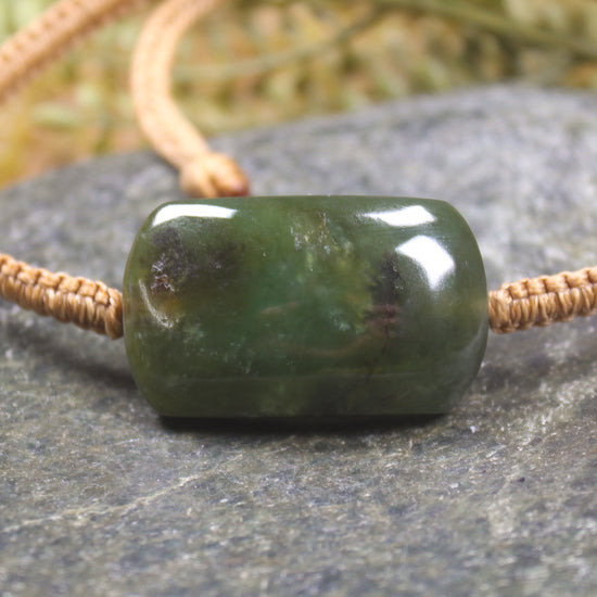Adjustable cord bracelet with Rimu Pounamu