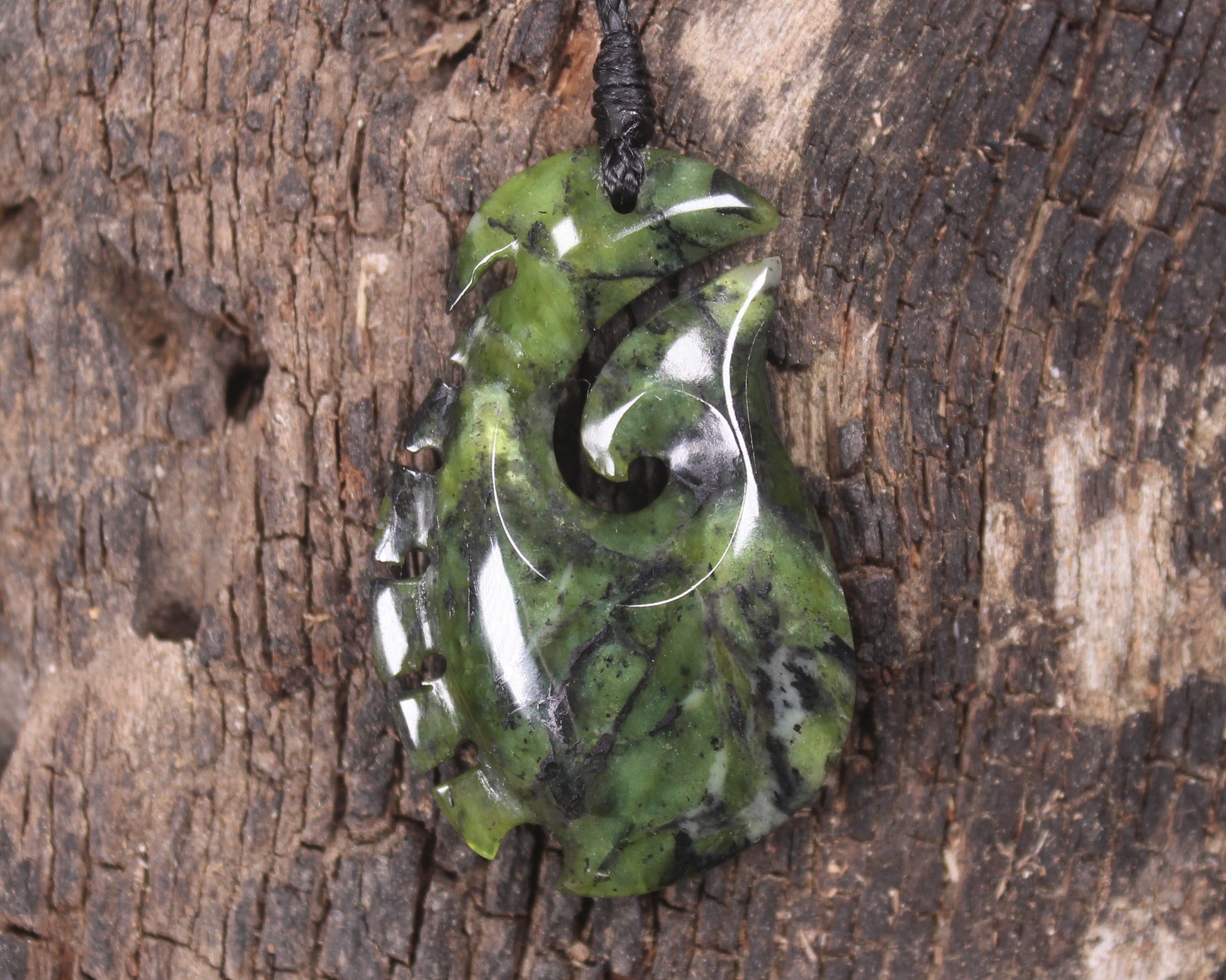 Douglas Creek pounamu hei matau pendant - NZ Greenstone