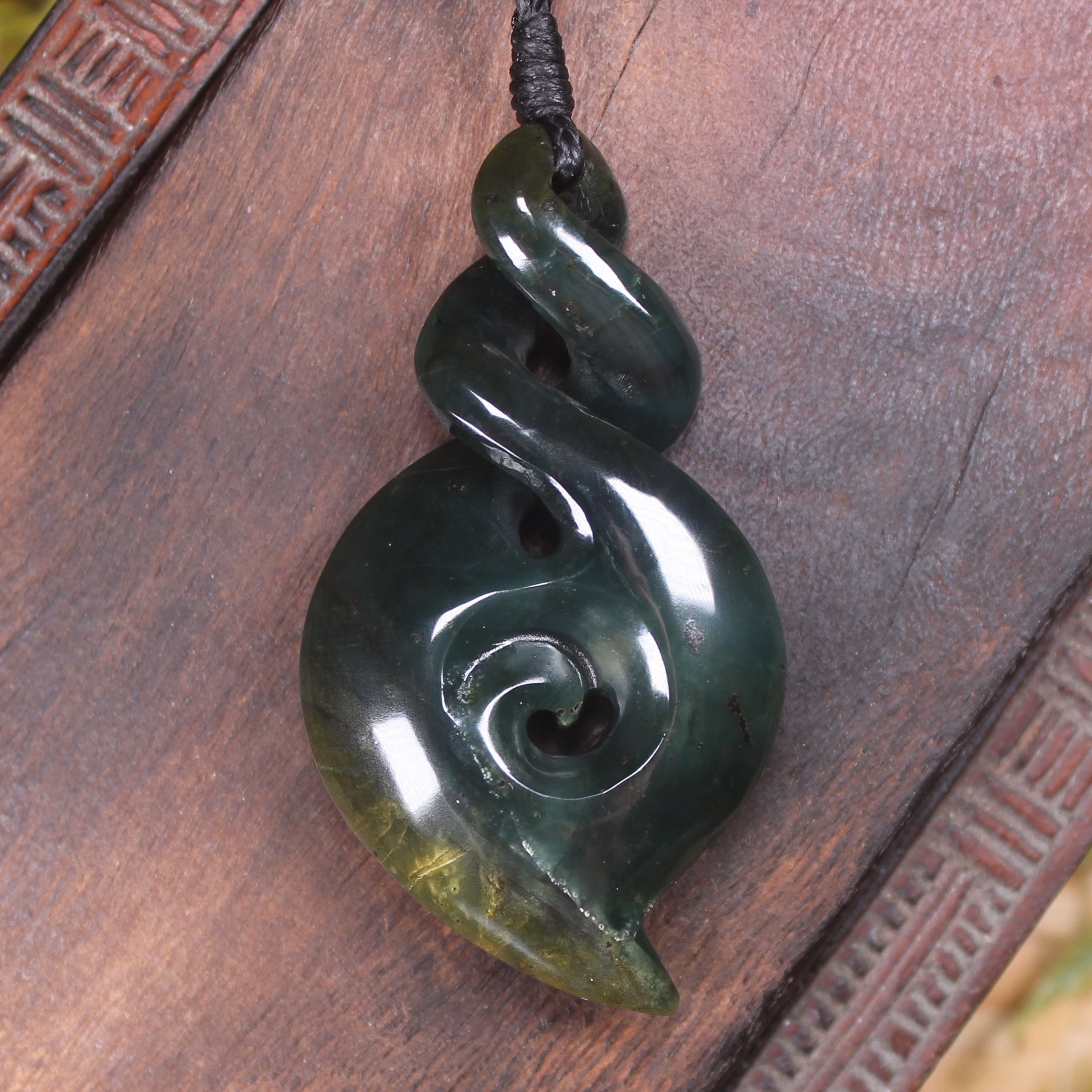 Koru Twist carved from Kawakawa Pounamu - NZ Greenstone