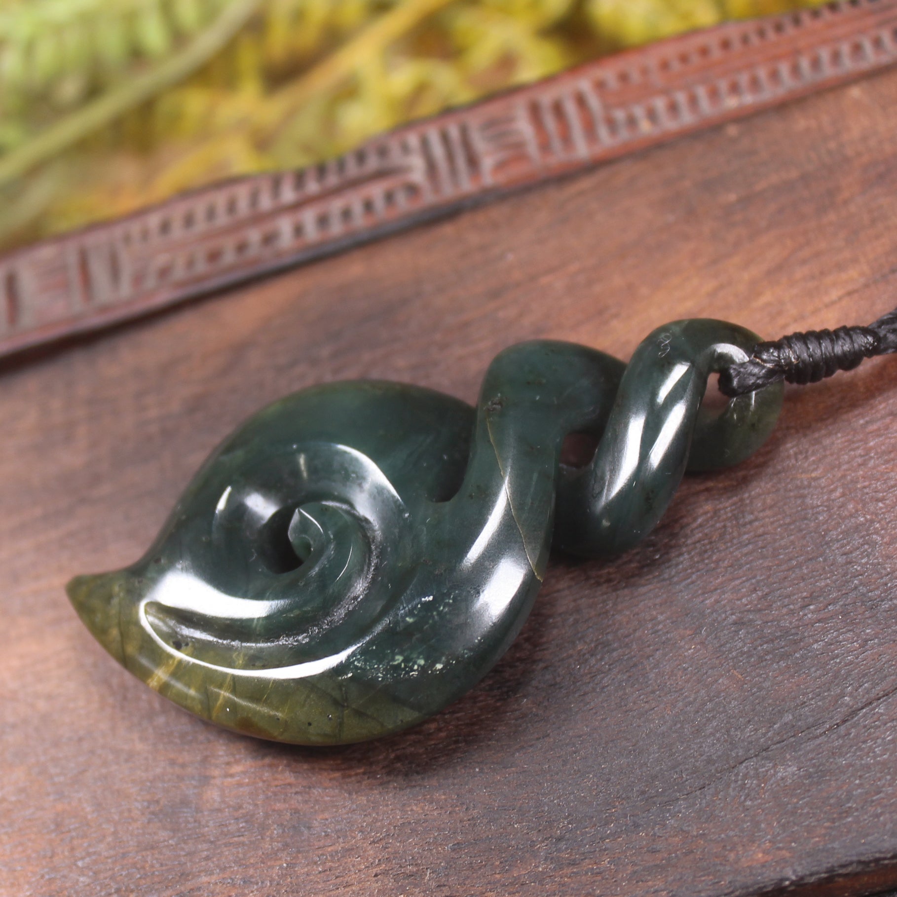 Koru Twist carved from Kawakawa Pounamu - NZ Greenstone