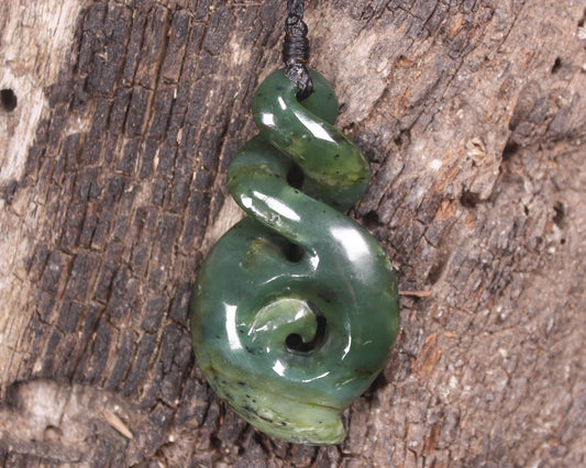 Hapopo Pounamu Koru Twist pendant - NZ Greenstone