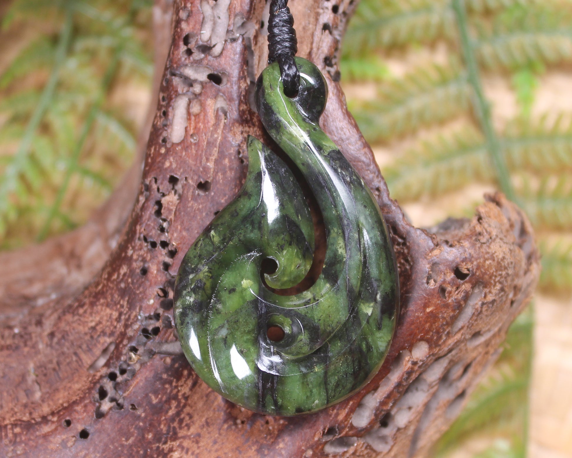 Douglas Creek pounamu hei matau pendant - NZ Greenstone