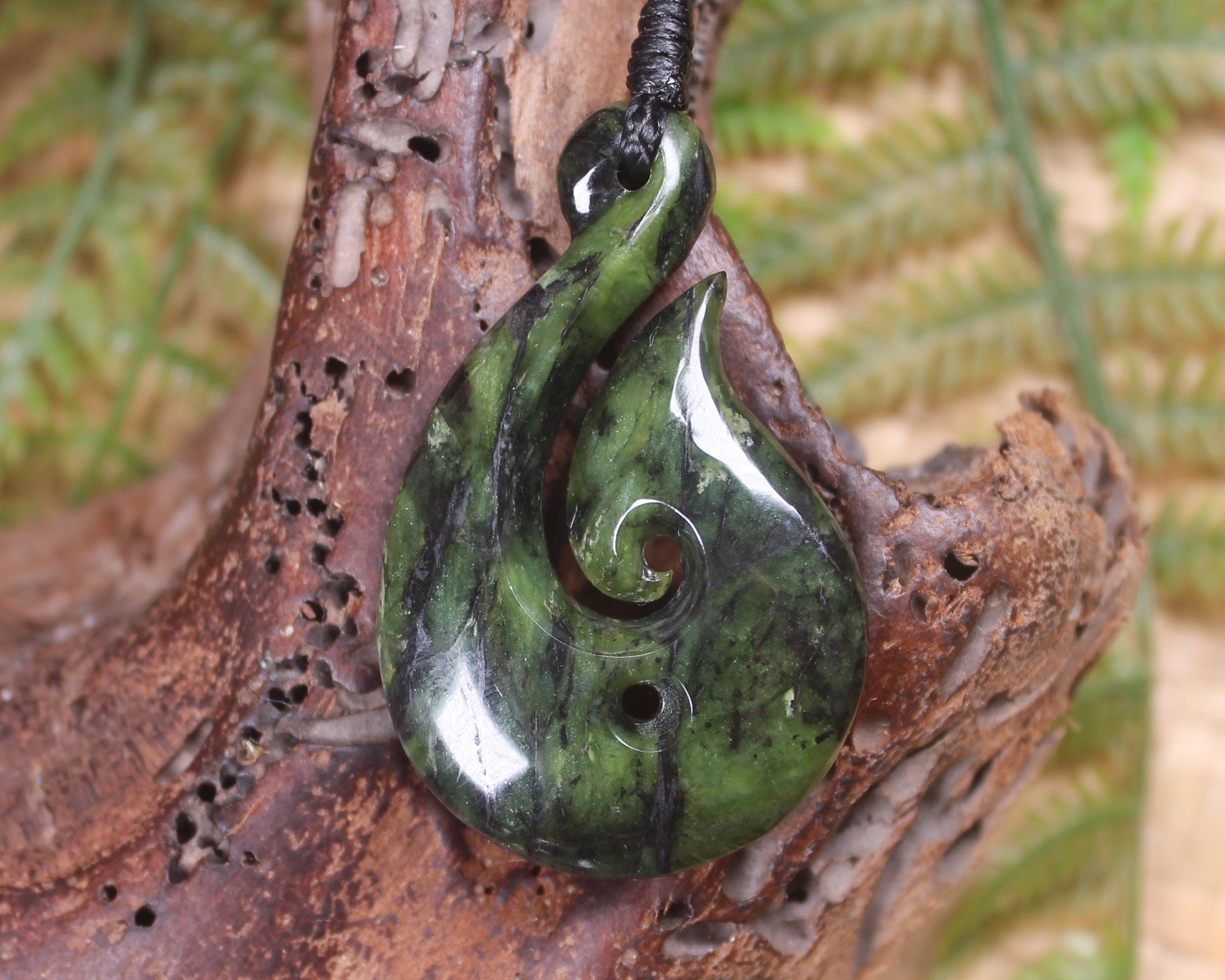 Douglas Creek pounamu hei matau pendant - NZ Greenstone