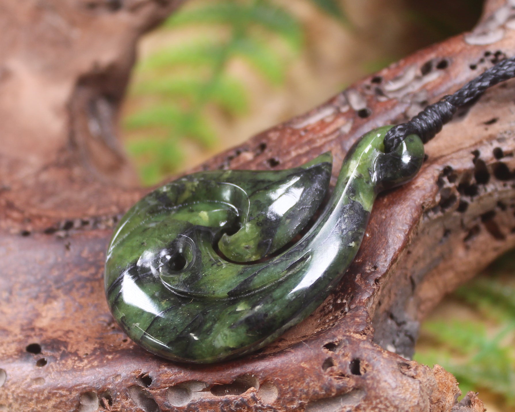 Douglas Creek pounamu hei matau pendant - NZ Greenstone